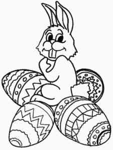 Easter Bunny sits on eggs coloring page